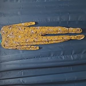 Green/brown and white large dinosaur footie pajamas